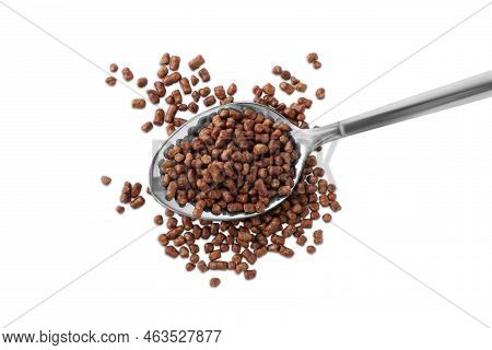 Spoon With Buckwheat Tea Granules On White Background, Top View