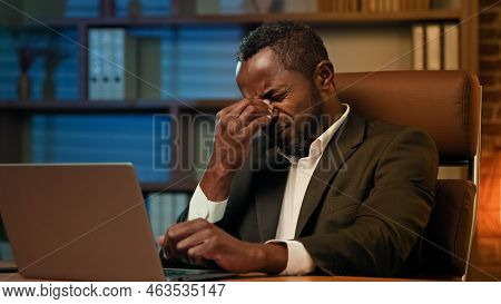 Adult African American Businessman Working On Laptop In Office Unhealthy Tired Man Suffering From He