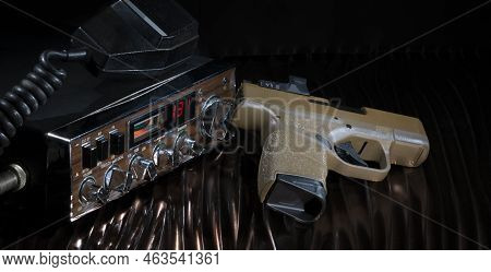 Sideband Two Way Radio On Channel 13 With Semi-automatic Pistol