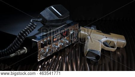 Channel 13 On A Sideband Cb Radio With Semi-auto Pistol On The Side