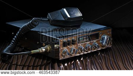 Sideband Cb Radio On A Wavy Bronze Colored Surface