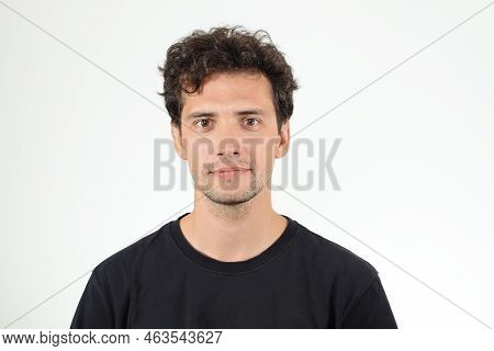 Nice Young Boy In Black T-shirt Posing To Camera