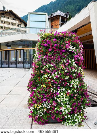 Ischgl, Austria - July 25, 2022: Floral Decoration In Front Of Cultural Center Saint Nicholas In Isc