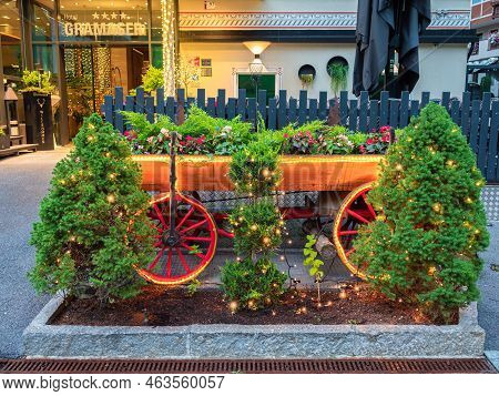 Ischgl, Austria - July 25, 2022: Evening Shot Of A Decorative Composition In Front Of Hotel Gramaser