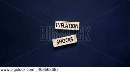 Inflation Shocks Symbol. Concept Words Inflation Shocks On Wooden Blocks. Beautiful Black Table Blac
