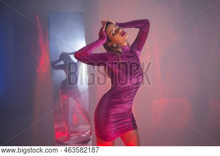 Glamorous Portrait Of A Young Beautiful Blonde In A Stylish Scarlet Short Dress, Stylish Shooting Wi