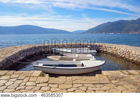 Beautiful Autumn Mediterranean Landscape. Fishing Boats At Small Stone Jetty. Montenegro, Adriatic S