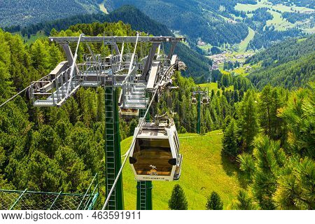 Italy 19.06.2019: Cabin Of Cable Car Lift Col Raiser Arrive To Top Of The Mountain With Place Of Res