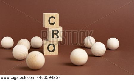 Three Toy Wood Blocks With Letters Cro On A Table With Brown Background, Selective Focus. Cro - Shor