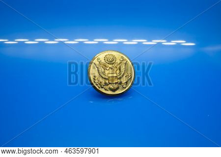 Louisiana/usa  - July 06 2019: A Single Golden Military Button.