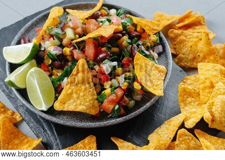Texas Dish. Cuisine Of The United States. Vegetarian Texas Caviar With Chips And Nachos. Reducetaria