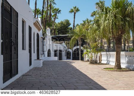 A Street With Traditional Architecture And Painted White In The Town Of Almunecar, South Of Granada,