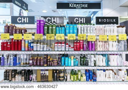 Latvia, Riga, August, 2022: Shelves With Chi  Professional Hair Care Products With Promotional Price