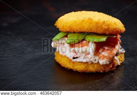 Pan-asian Cuisine Concept. Japanese Sushi Burger Made From Rice Bread, Crab Meat, Avokado And Wasabi