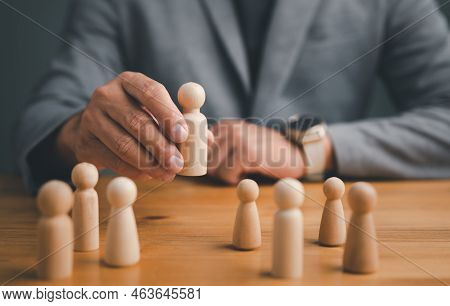 Hr Manager Hand Or Employer Chooses Takes In Hand Employee. Leader Stands Out From Crowd. Looking Fo