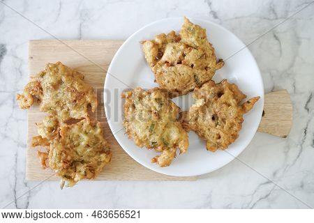 Bakwan Goreng, Fried Food, Indonesian Traditional Street Food Snacks. Fried Vegetables Dough Fritter