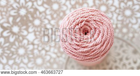 Handmade Macrame Braiding And Cotton Threads In White Basket. Cotton Macrame Cords And Ropes Against