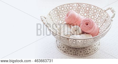 Handmade Macrame Braiding And Cotton Threads In Basket On White Background. Cotton Macrame Cords And