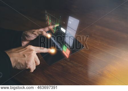 Success Business Concept. Businessman Hand Touch Hologram Of Stock Chart Or Cryptocurrency Chart Wit