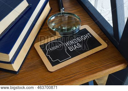 Hindsight Bias Inscription On The Plate And Magnifying Glass.