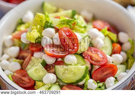 Summer Salad. Fresh Salad With Mozzarella. Lettuce With Cherry Tomatoes, Cucumbers And Mozzarella. B
