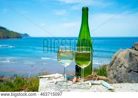 Tasting Of Txakoli Or Chacolí Slightly Sparkling Very Dry White Wine Produced In The Spanish Basque