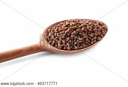 Wooden Spoon With Buckwheat Tea Granules On White Background