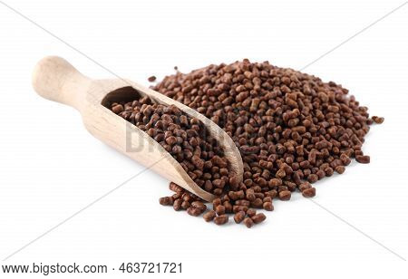 Wooden Scoop With Buckwheat Tea Granules On White Background