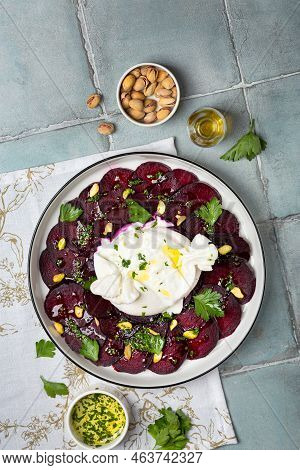 Beetroot Carpaccio With Mozzarella Burrata Cheesse And Pistachios