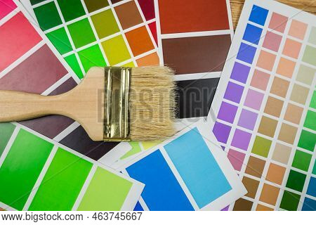 Paint Roller And Color Palette Guide Close-up.color Palette, Paint Swatch Guide, Color Catalogue.