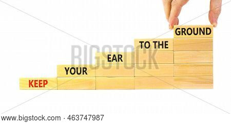 Keep Your Ear To The Ground Symbol. Concept Words Keep Your Ear On The Ground On Wooden Blocks. Busi