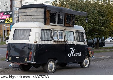 Krasnoyarsk, Russia - 24 September, 2022: Brown Nysa 522 Minibus Car With Mobile Coffee Shop On City