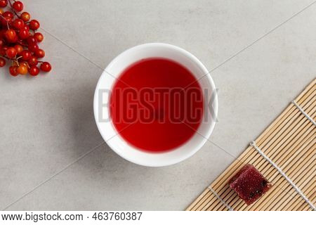 Omija Tea (omija Cha) Also Known As Schizandra Tea In White Bowl, Top View. Brewed With Schisandra B