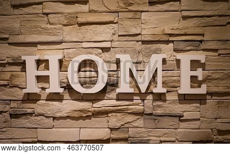 On A Wall Covered With Narrow Stones, The Word \