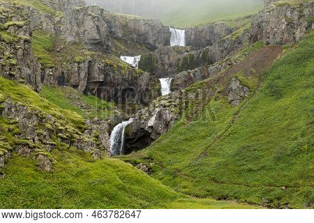 Klifbrekkufossar Falls In Summer Season View, Iceland. Icelandic Landscape.