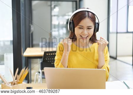 Young Woman Happy With Her Online Study.