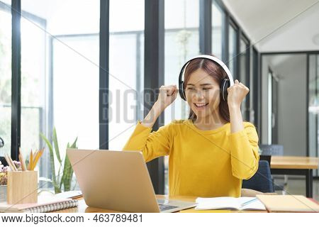 Young Woman Happy With Her Online Study.