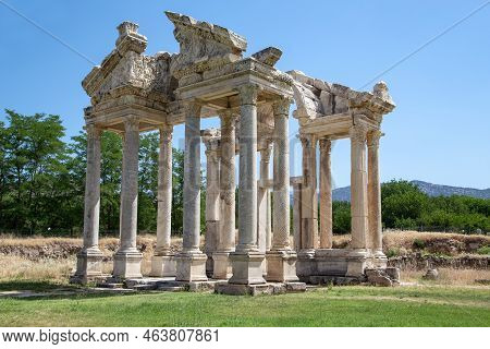Geyre, Turkey - May 30, 2021: These Are The Ruins Of The Monumental Arch (tetrapilon) In Ancient Aph