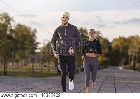 Jogging Ideas. One Positive Runners  Couple Posing Together During Running Training Fitness Exercise