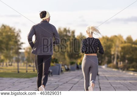 Jogging Ideas. Back View Of Runners  Couple Posing Together During Running Training Fitness Exercise