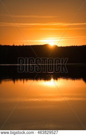 Sunset With Reflection On A Swedish Lake In Smalland. Romantic Evening Mood. Landscape Shot From Sca