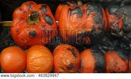 Close-up Of Bell Peppers And Tomatoes Grilled Over Charcoal. Top View. Tasty And Healthy Vegetables 