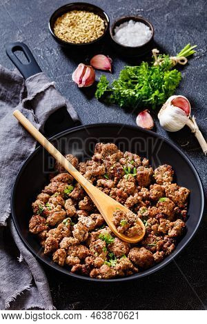 Fried Italian Sausage Of Freshly Ground Pork Meat And Spices In Skillet On Concrete Table With Inged