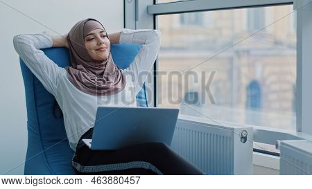 Young Arabic Female Professional With Laptop, Dreaming, Create New Idea. Smiling Millennial Indian E