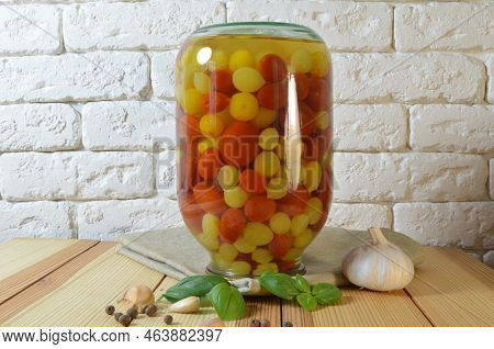 Tomatoes In A Jar. Red, Yellow Orange Fruits. Pickles. Proper Nutrition.