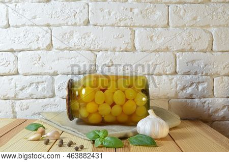 Tomatoes In A Jar. Red, Yellow Orange Fruits. Pickles. Proper Nutrition