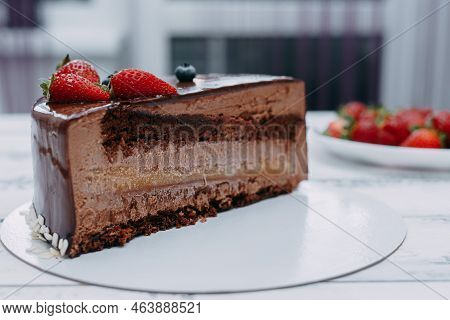 A Piece Of Chocolate Cake In The Cut. Preparation Of Mousse Cake At A Culinary Master Class. Cooking