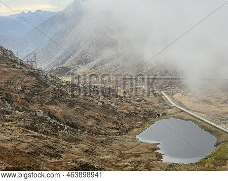 Autumn Atmosphere On The Nameless Lakes In The Swiss Alpine Area Of The St. Gotthard Pass (gotthardp