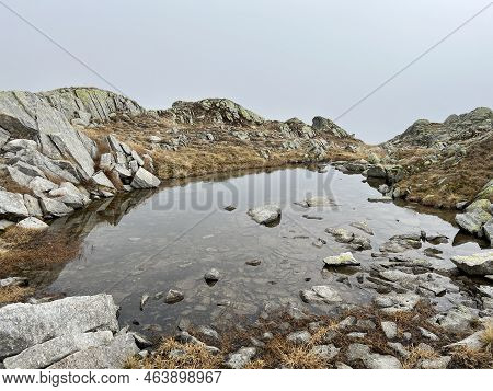 Autumn Atmosphere On The Nameless Lakes In The Swiss Alpine Area Of The St. Gotthard Pass (gotthardp