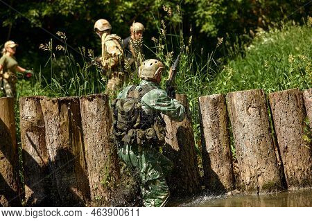 Full Military Experience - One Day Commando - Running Through The Water With Automatic Rifle Replica